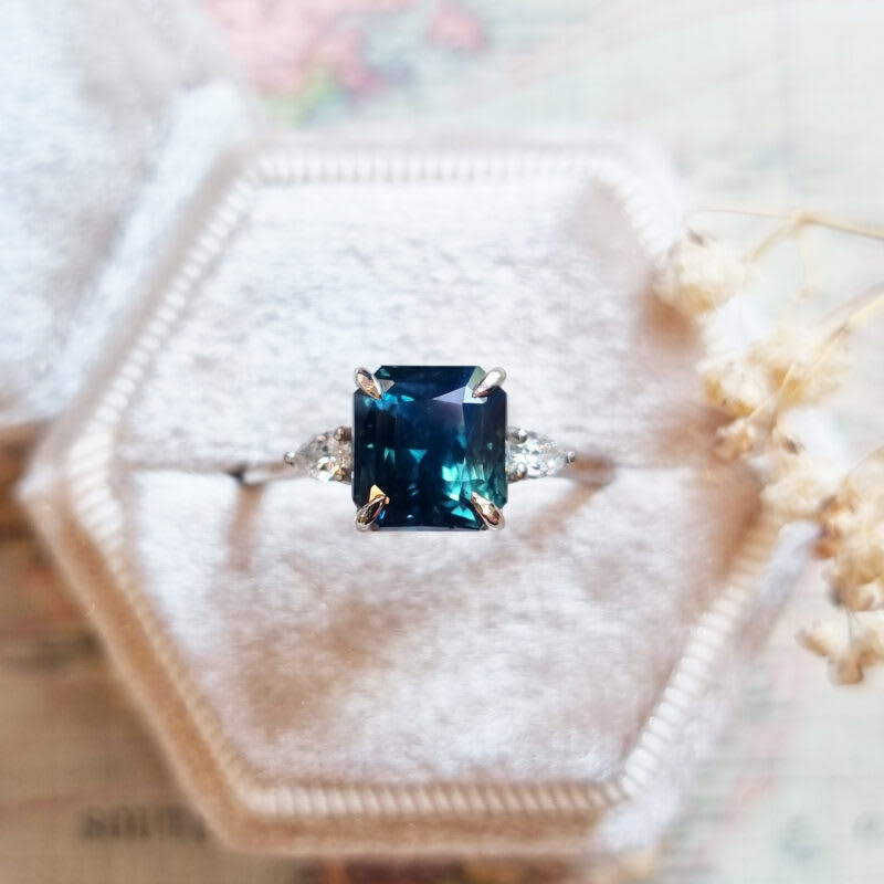 Emerald cut teal sapphire and pear diamond trilogy ring — 2