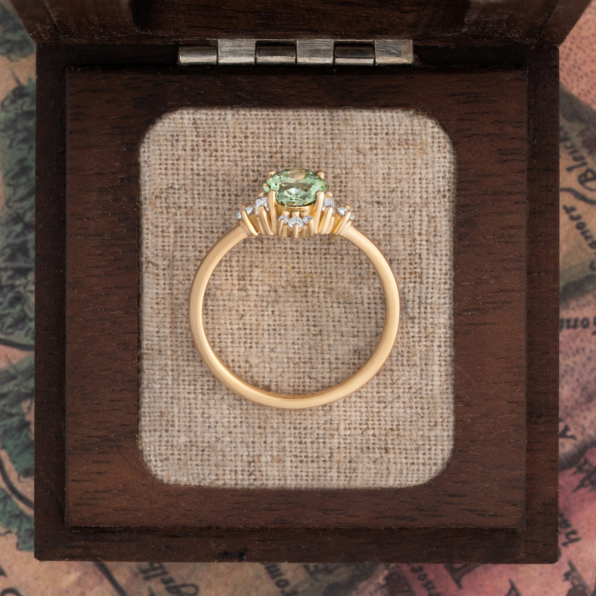 Oval green diamond cluster ring  — 3