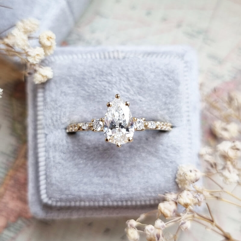 Pear cut lab grown diamond ring in 18ct yellow gold