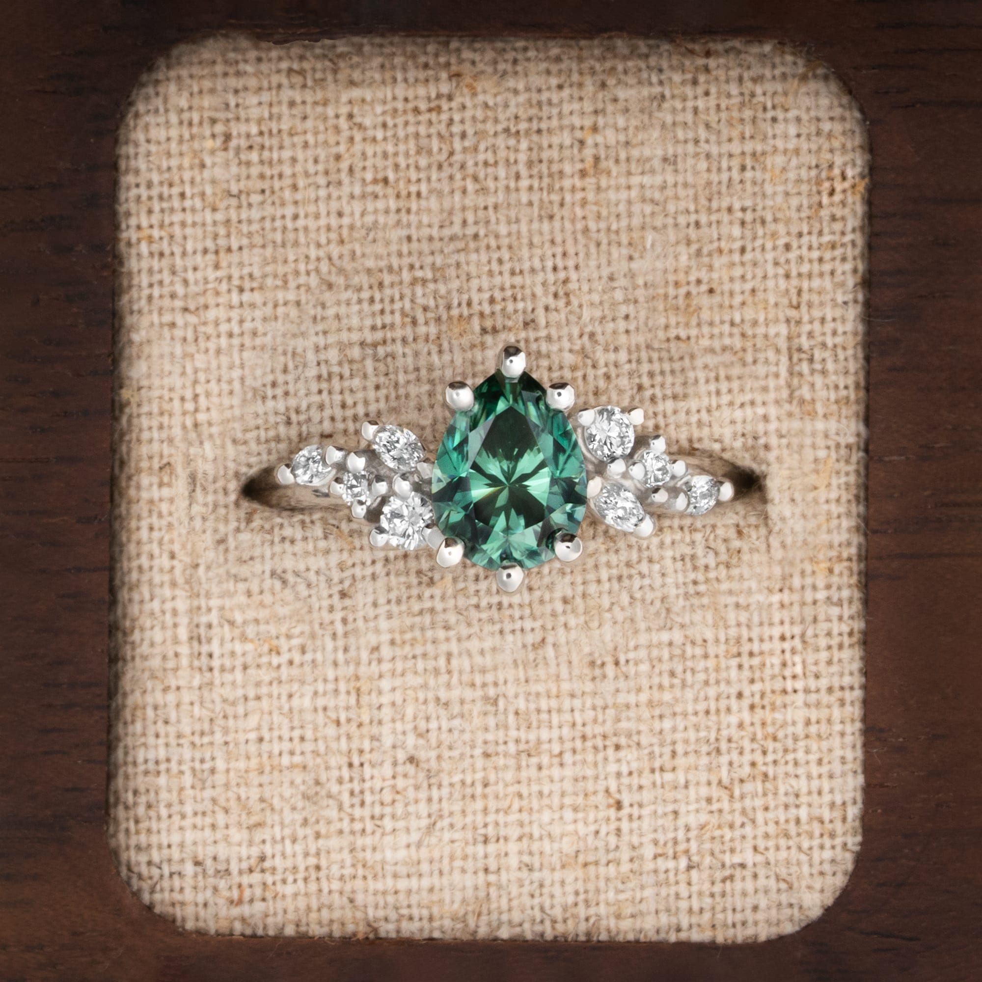 Teal green pear moissanite and diamond floral ring