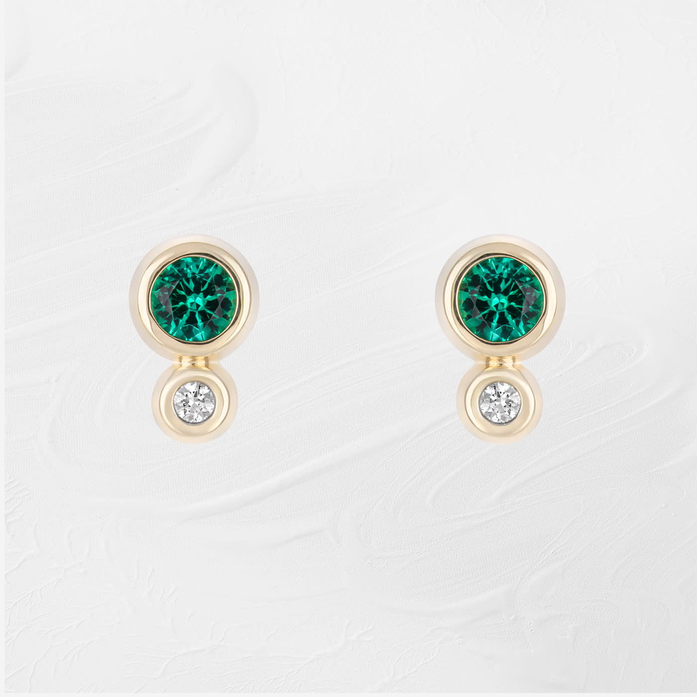 Two stone emerald and diamond earrings — 1