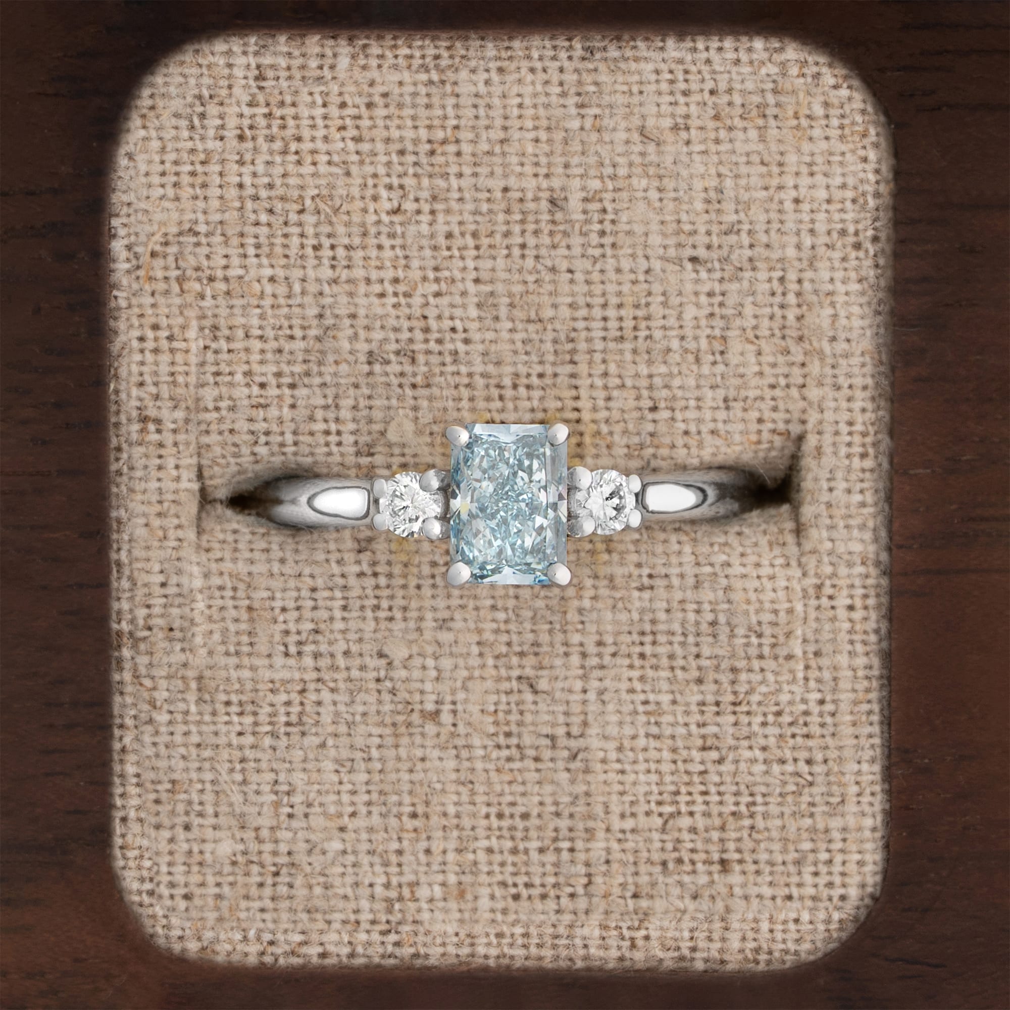 Light blue lab grown diamond trilogy ring — 1