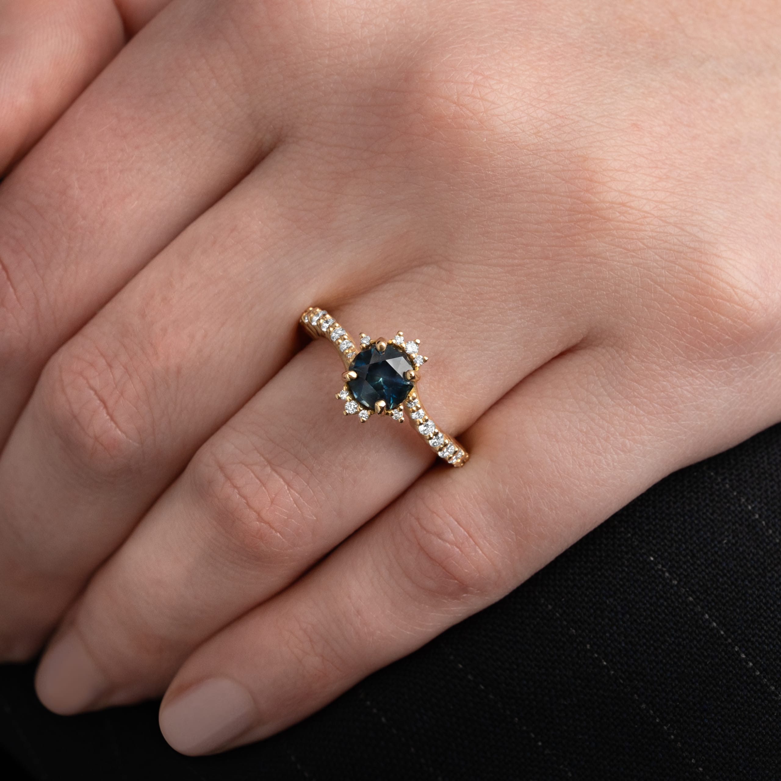 Intense precision cut deep teal sapphire and diamond twist ring — 2