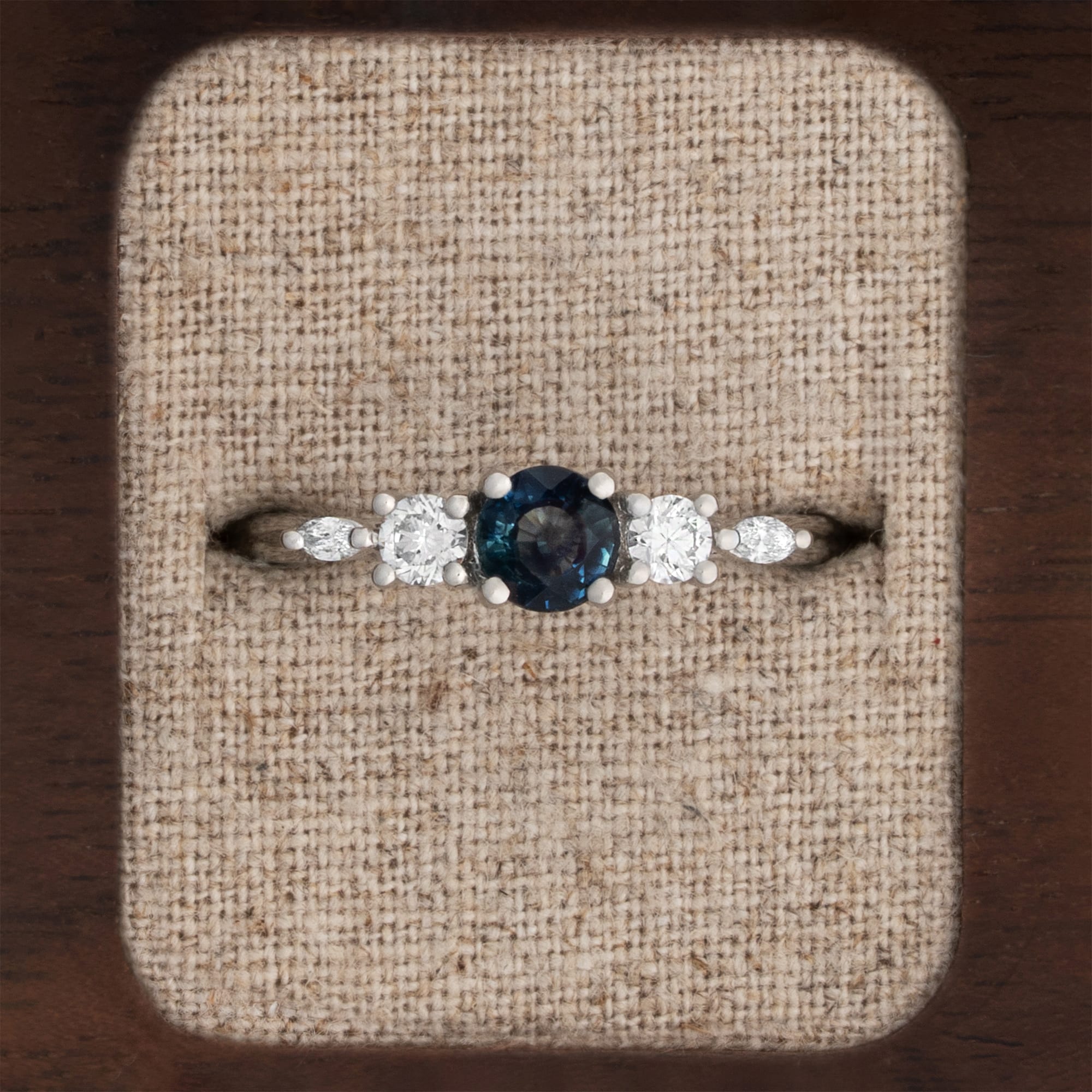 'Sonder' Dark ocean blue sapphire and diamond trellis ring 