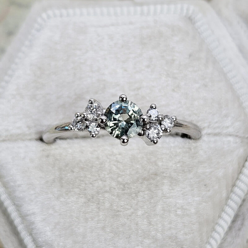 Lab seafoam sapphire and diamond cluster engagement ring