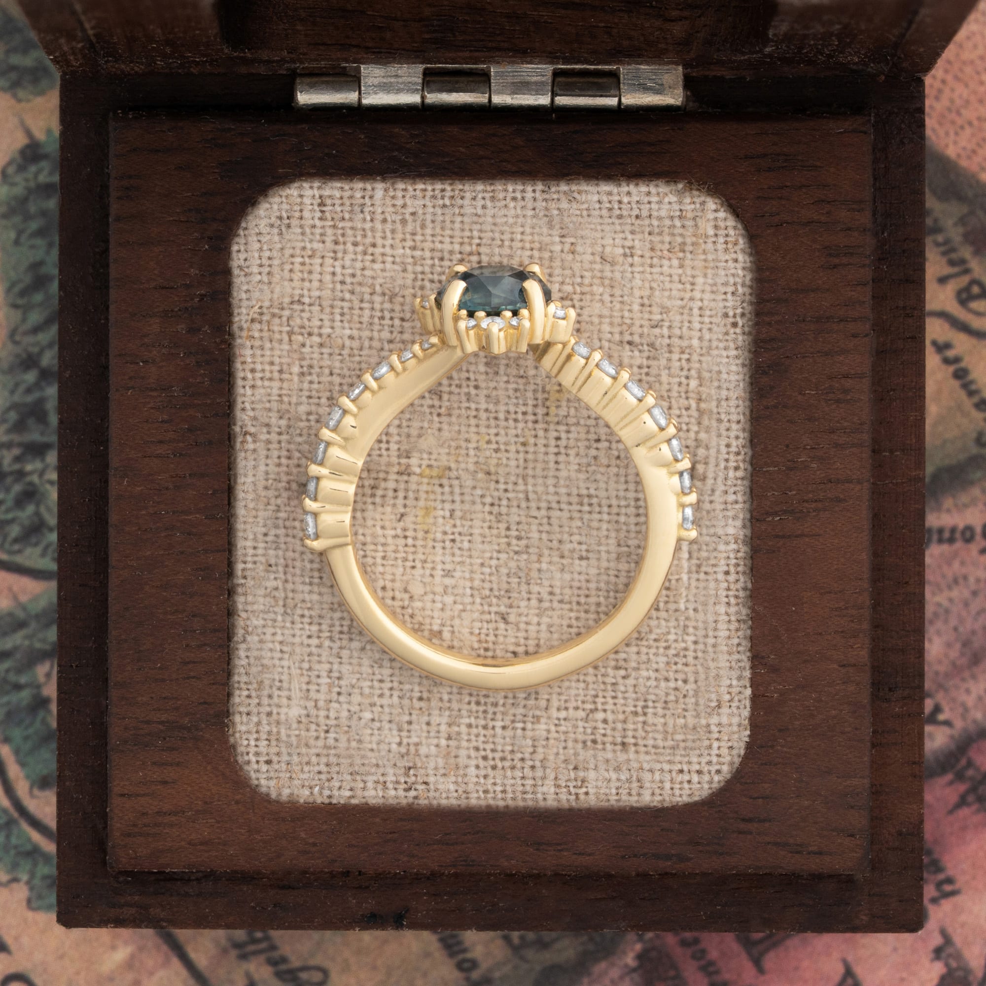 Intense precision cut deep teal sapphire and diamond twist ring — 4