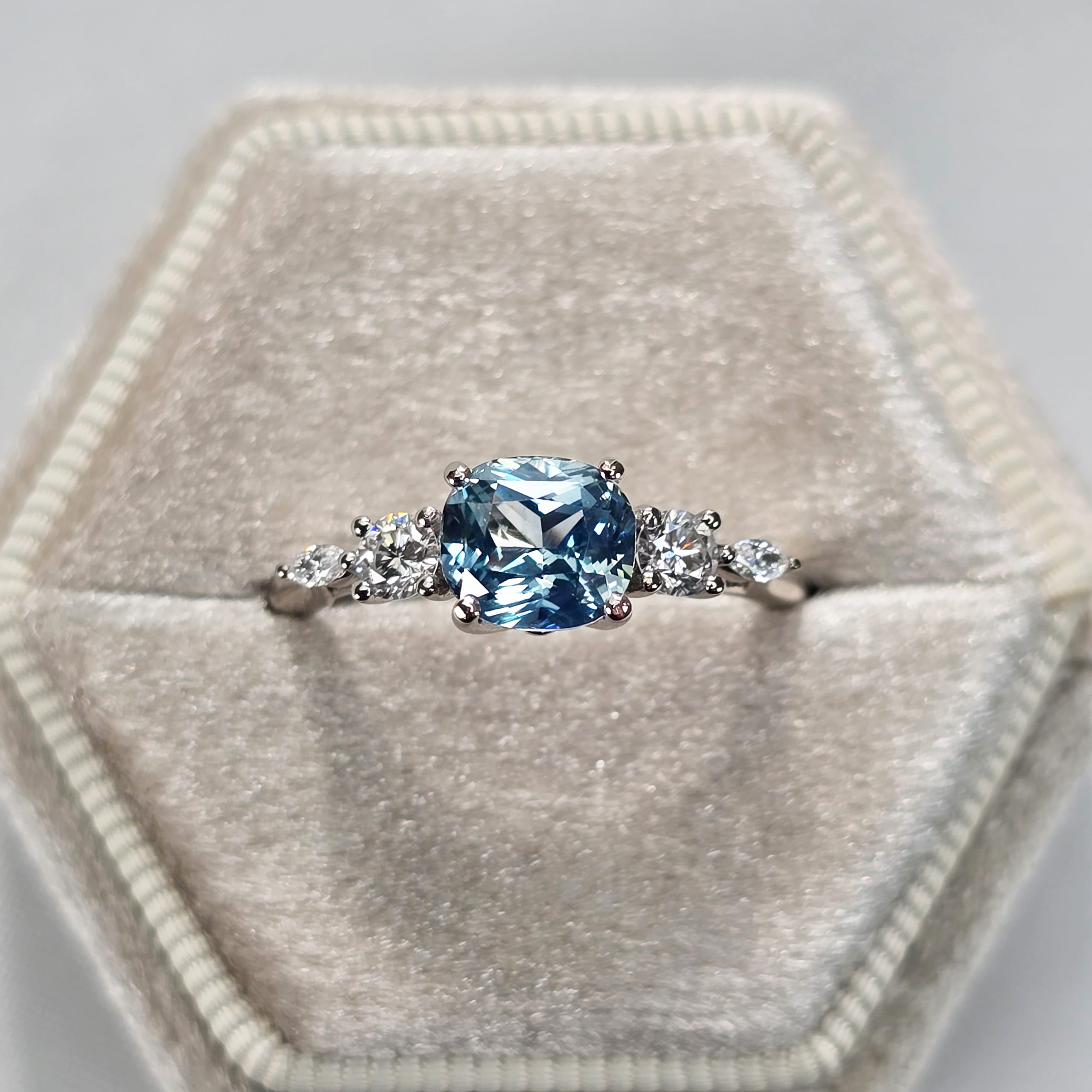 Icy teal sapphire and diamond ring in 18ct grey gold — 1