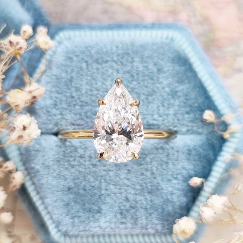 Pear cut lab grown diamond solitaire ring
