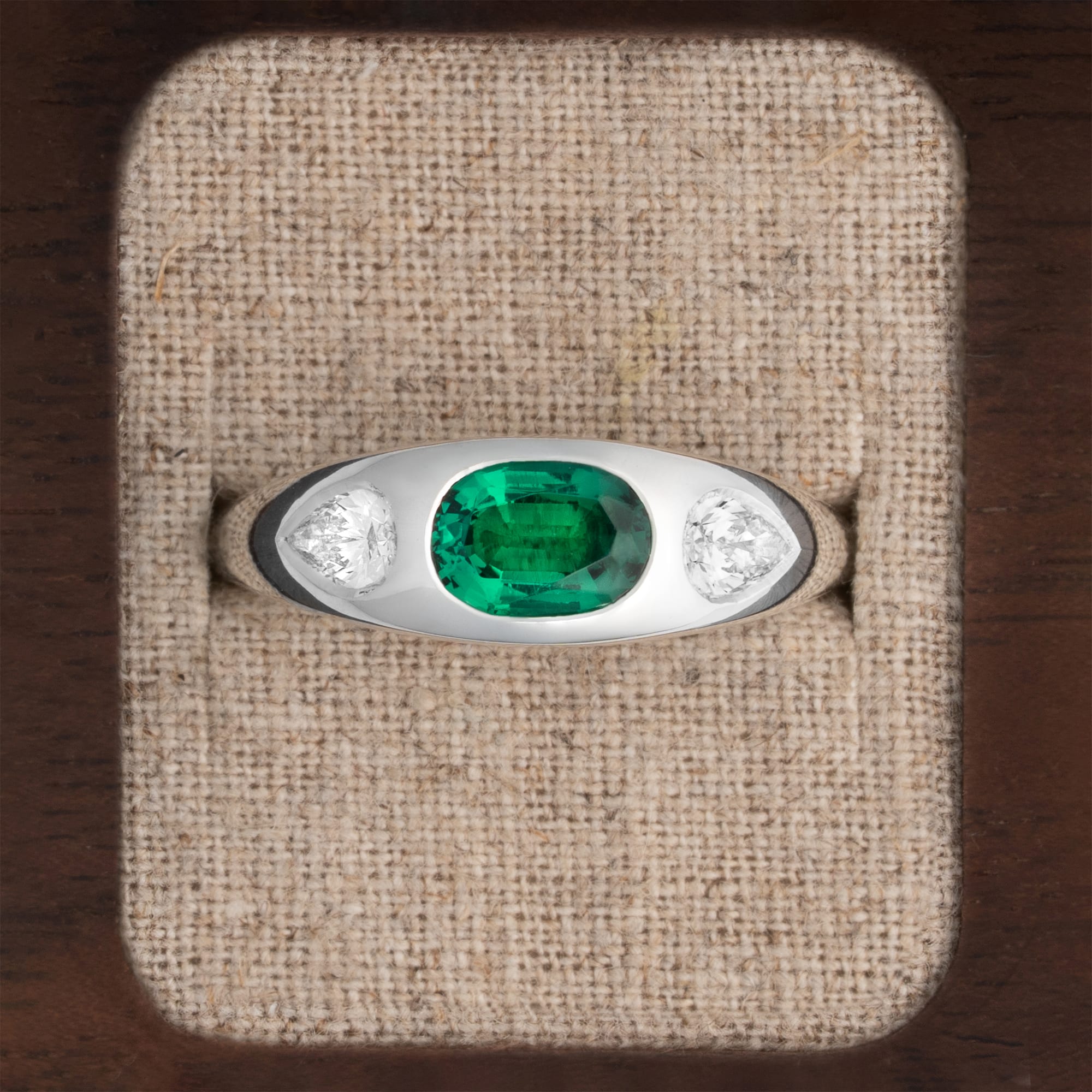 Lab Emerald and diamond bezel set ring 