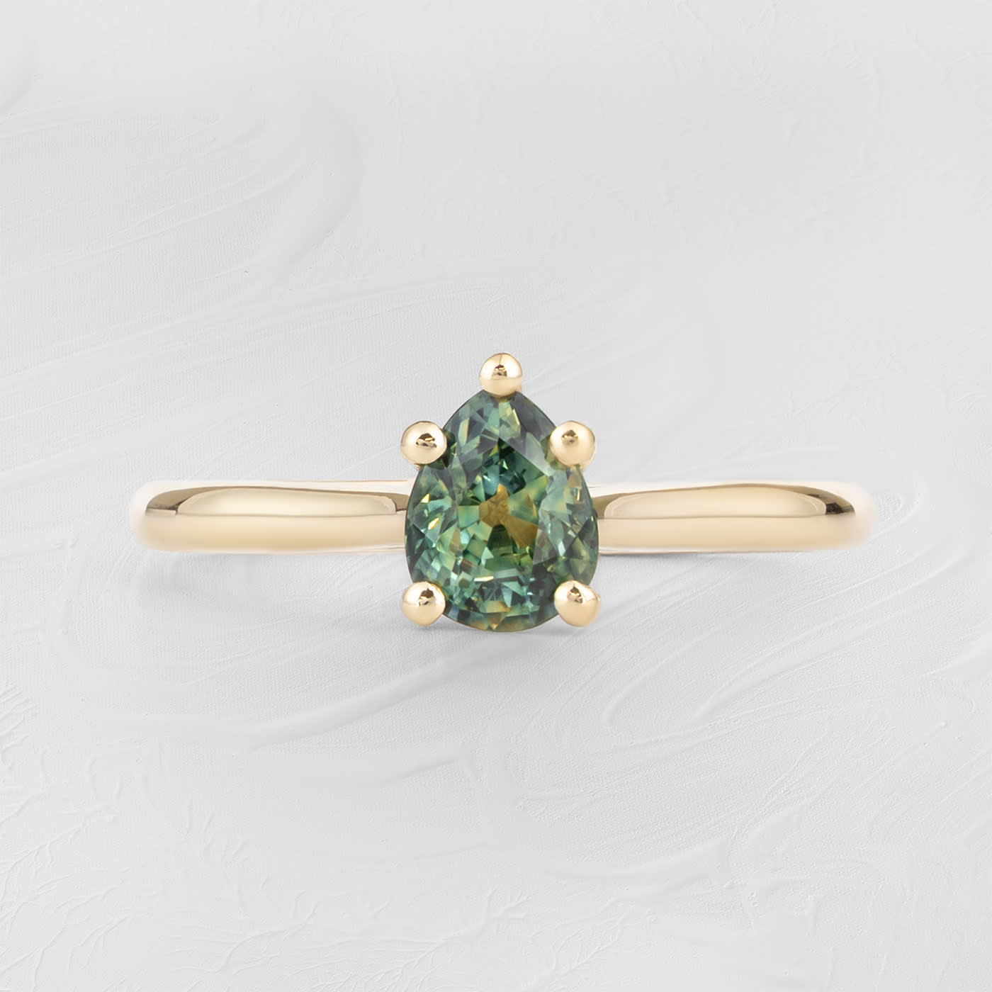 Pear cut parti sapphire solitaire ring — 1