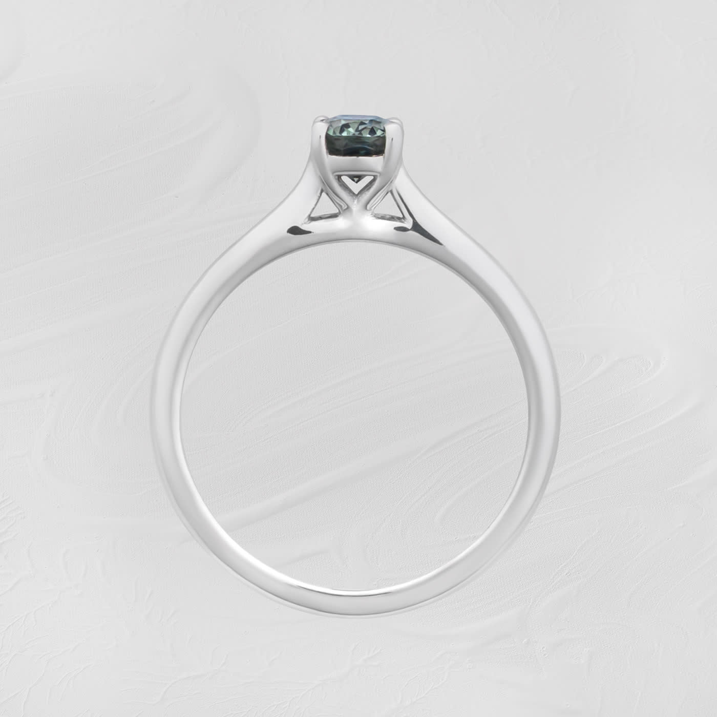 Oval teal sapphire solitaire  — 2