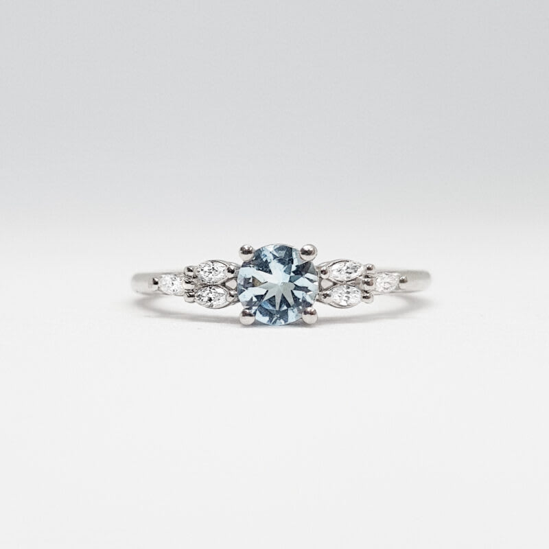 Aquamarine and marquise diamond ring