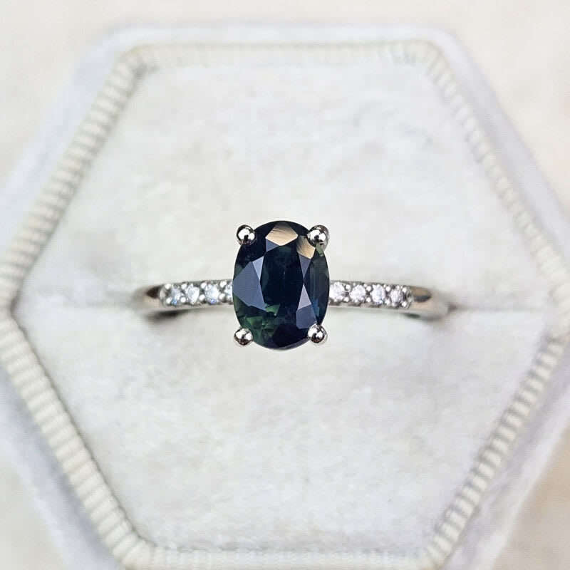 Smoky teal and diamond ring in platinum