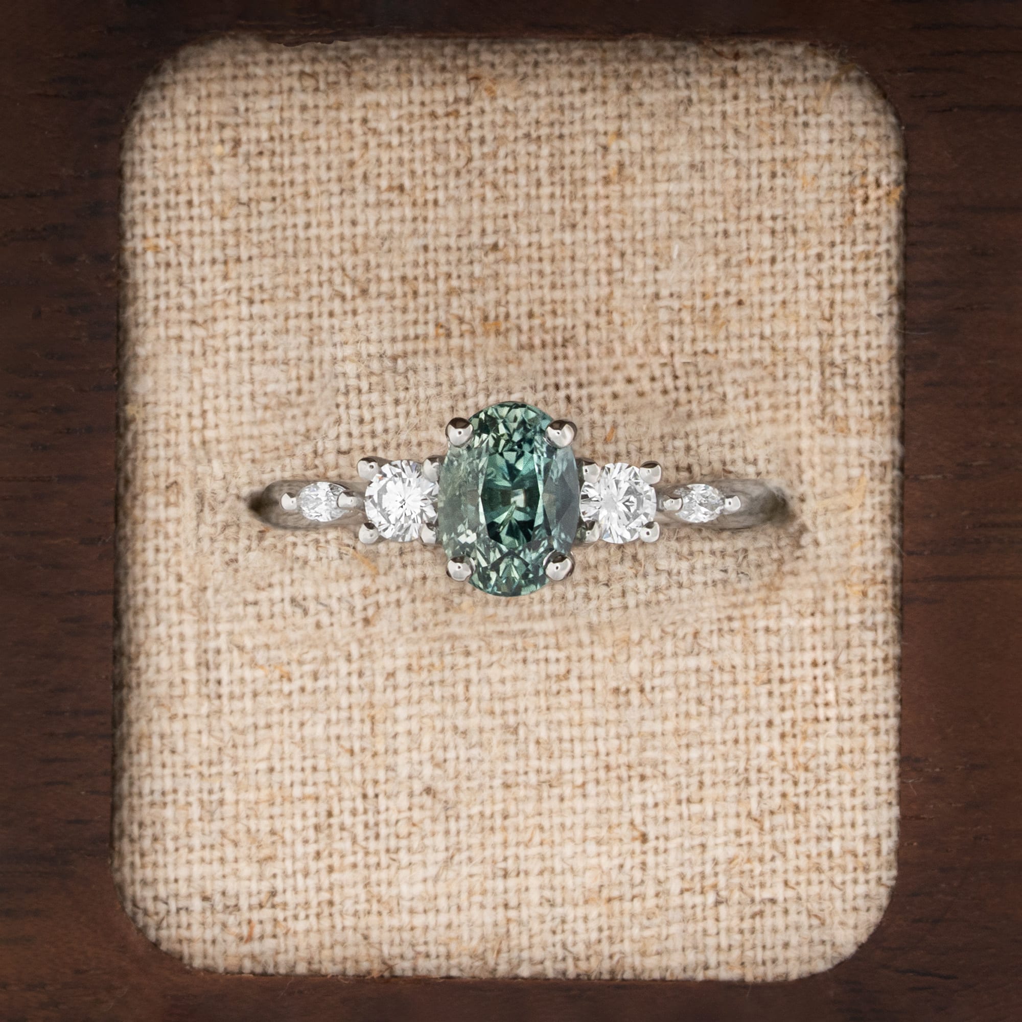Oval teal sapphire and diamond trellis ring  — 1