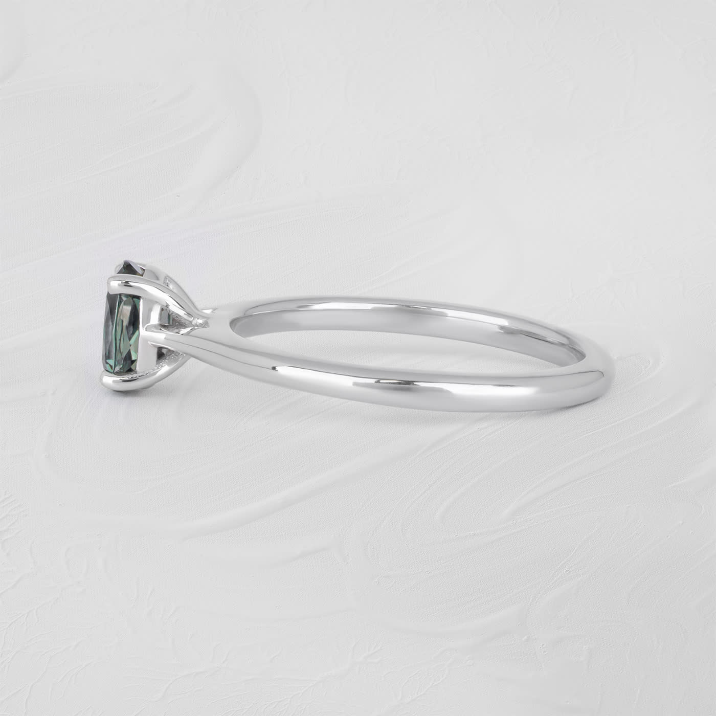 Oval teal sapphire solitaire  — 3