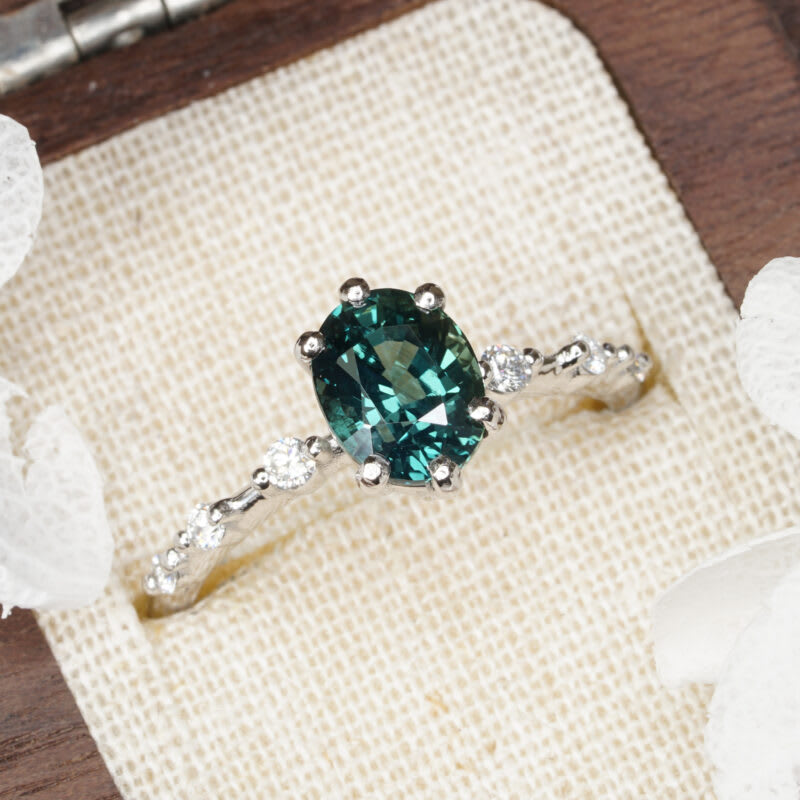 Oval teal sapphire and diamond ring — 1