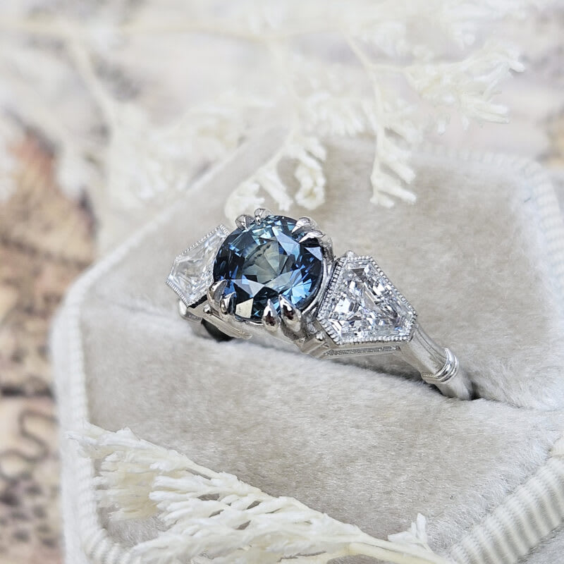 Icy sapphire and diamond oval engagement ring in platinum — 2