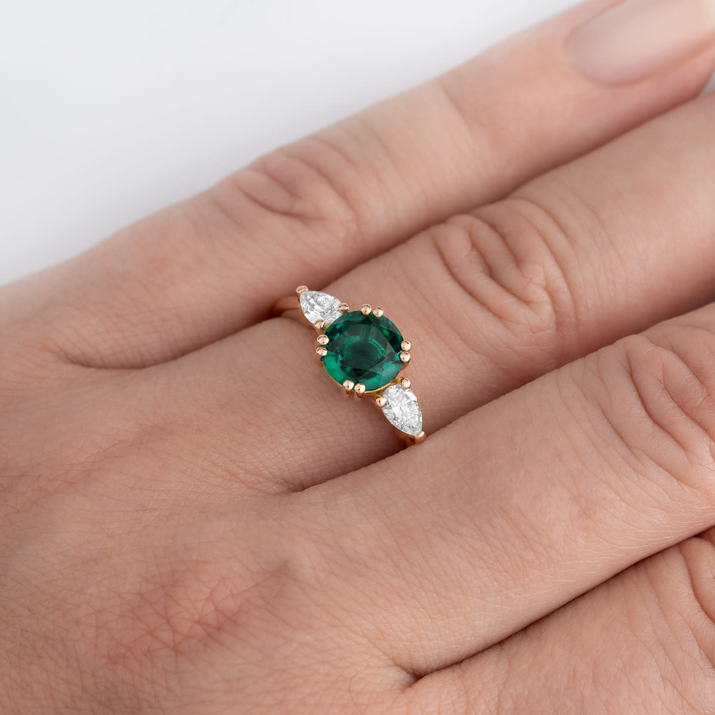 Lab emerald and pear diamond trilogy ring — 2