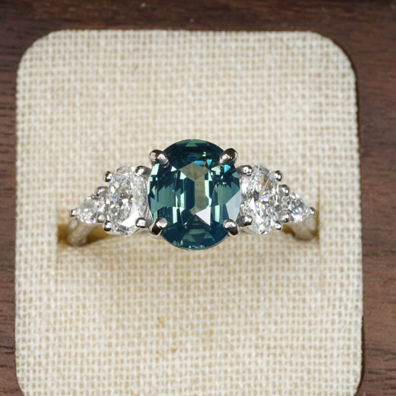 Oval teal sapphire and diamond ring — 1