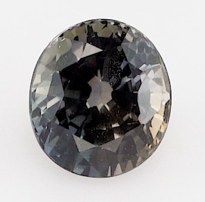 0.71ct oval purple and green sapphire product image