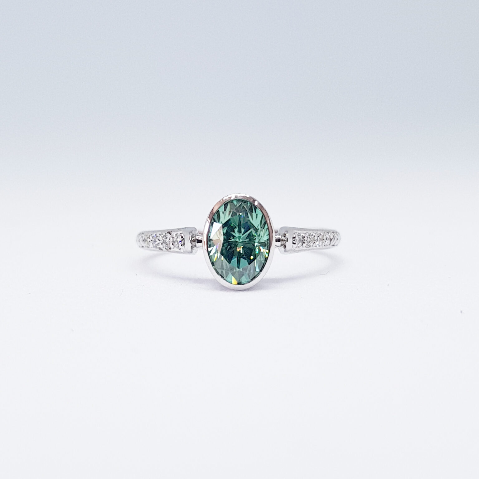 Teal green Moissanite and diamond engagement ring product image