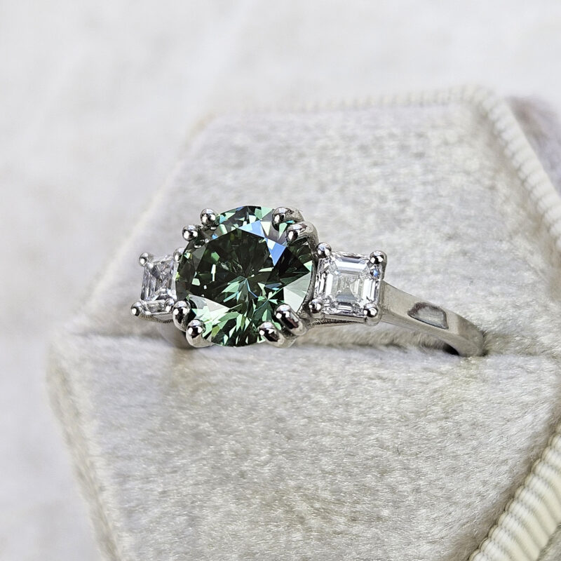 Lab grown green diamond trilogy ring in platinum product image