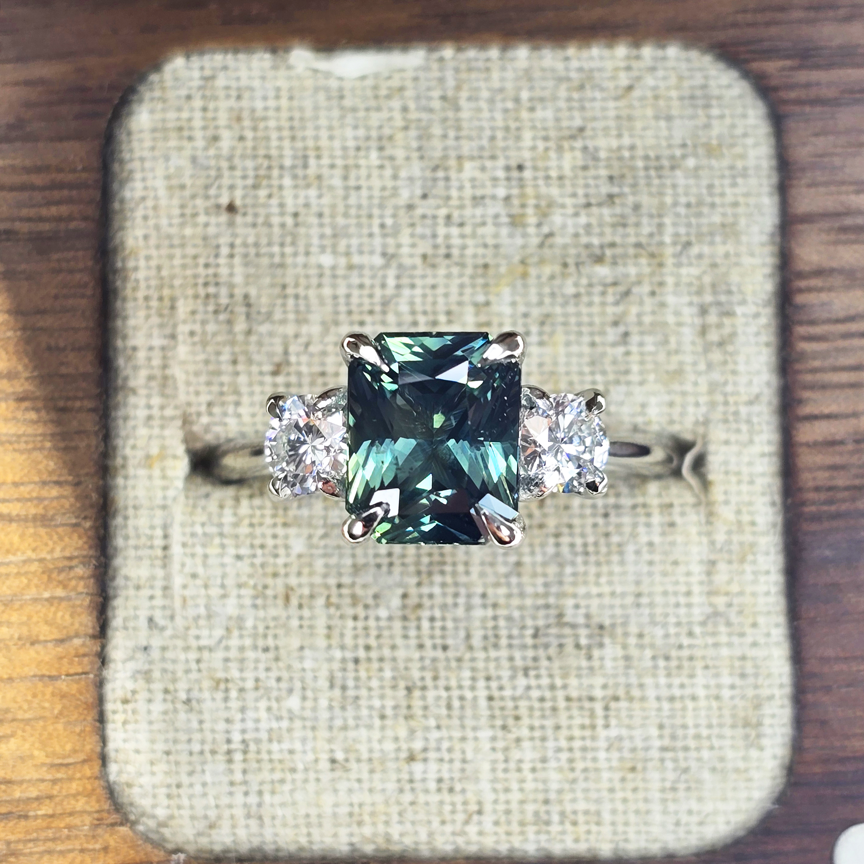 Radiant teal sapphire and diamond ring product image