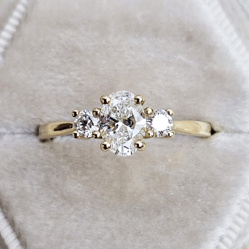 Oval and round lab grown diamond trilogy ring product image