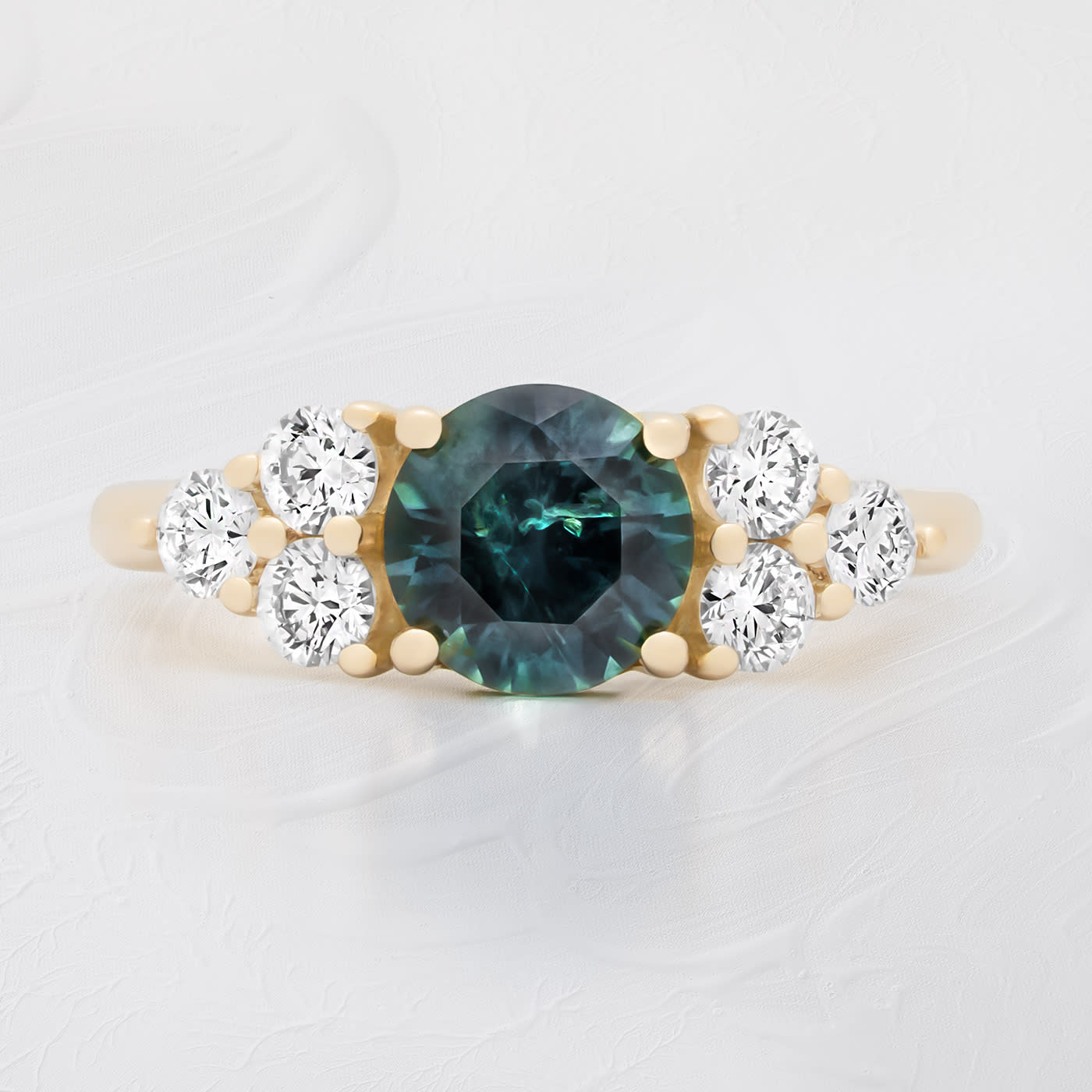 Australian precision cut teal sapphire and diamond ring product image