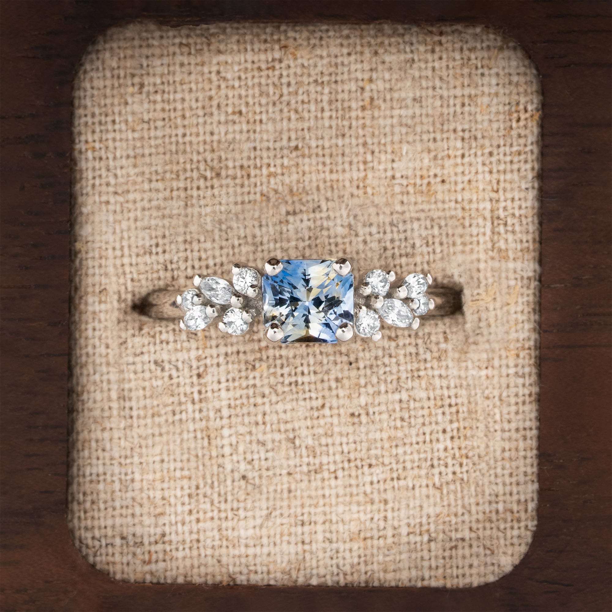 Square radiant cut icy blue sapphire and diamond ring
