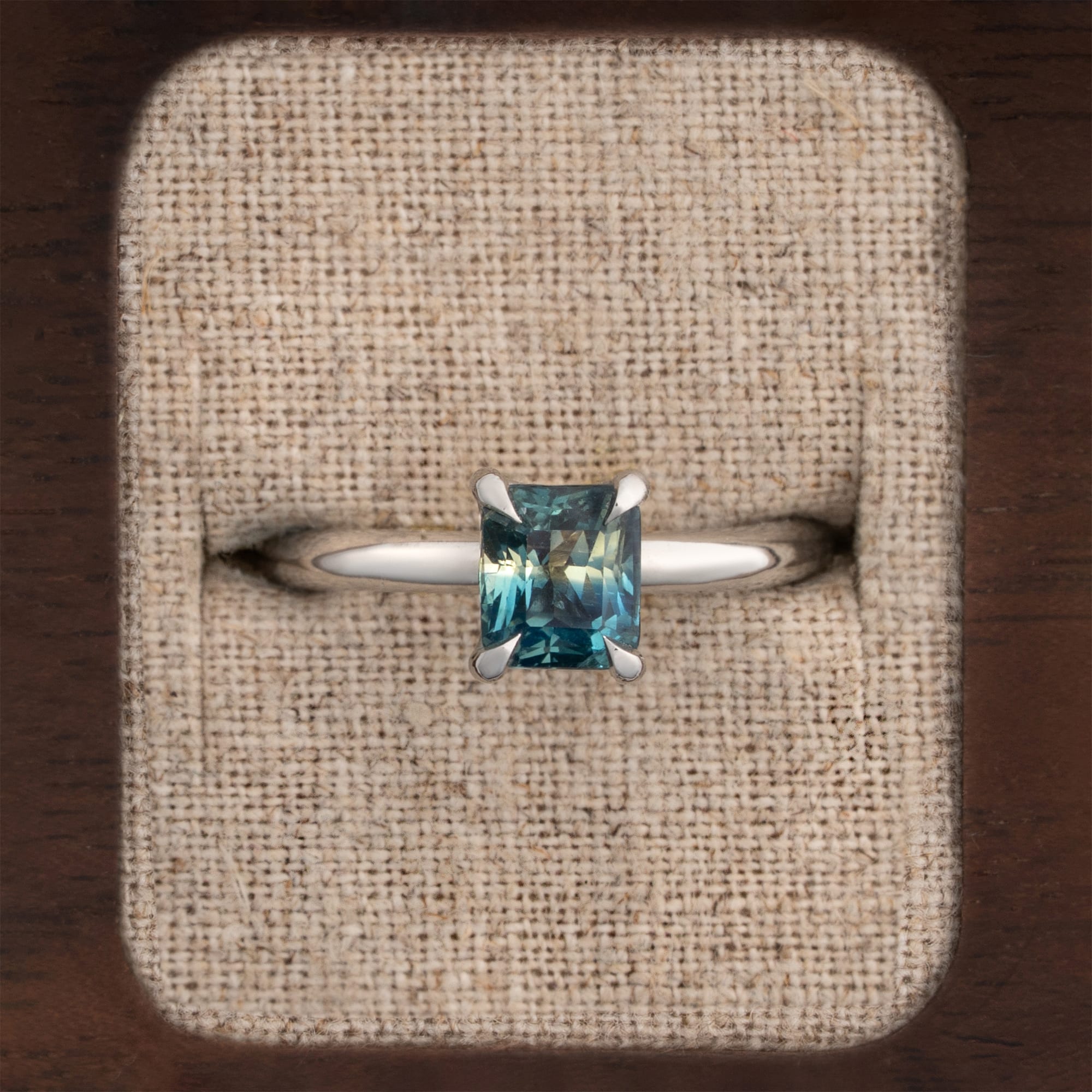 Cushion cut parti sapphire solitaire ring