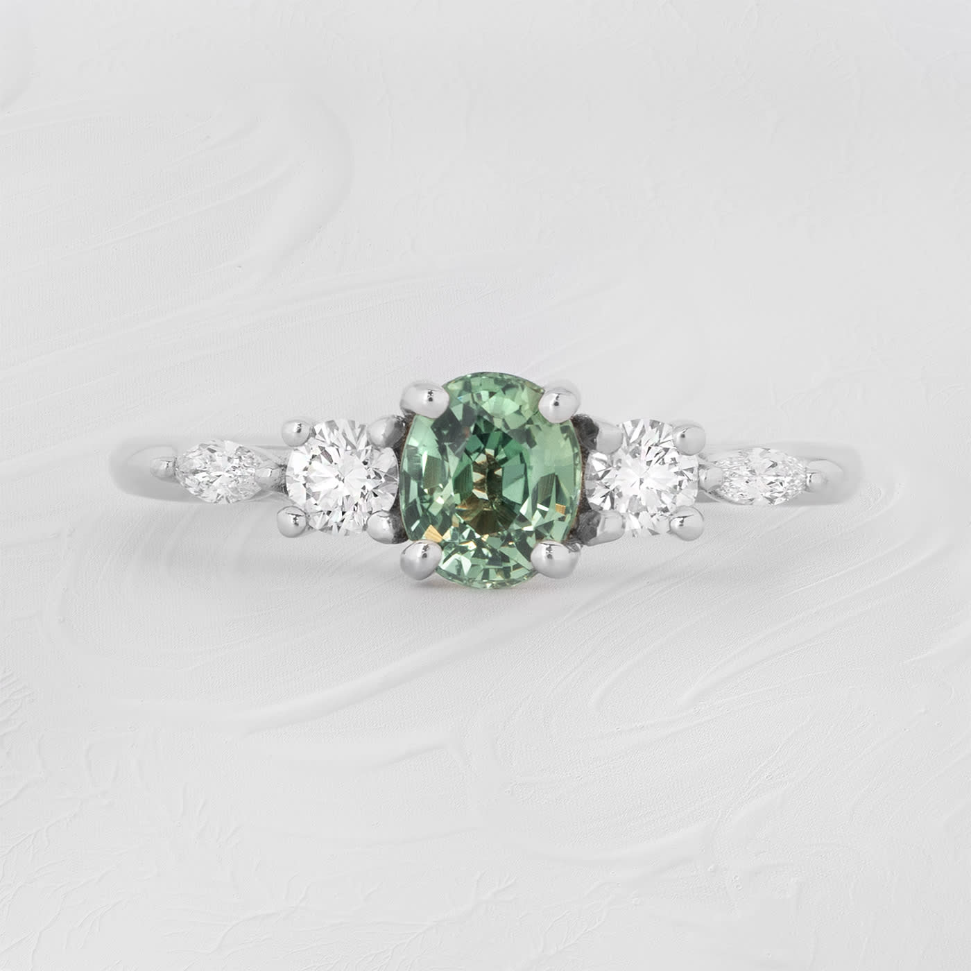 Oval teal sapphire and diamond trellis ring  product image
