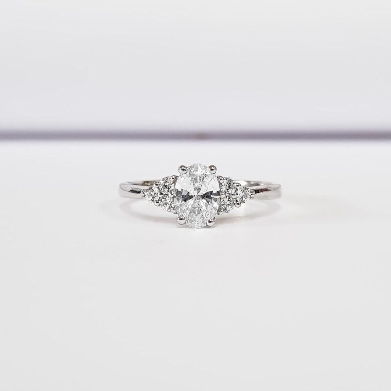 Moissanite and diamond oval engagement ring product image