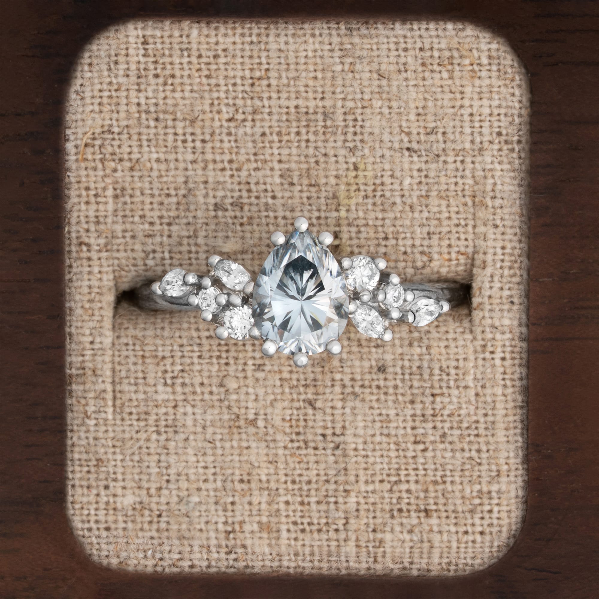 Light grey pear moissanite and diamond floral ring