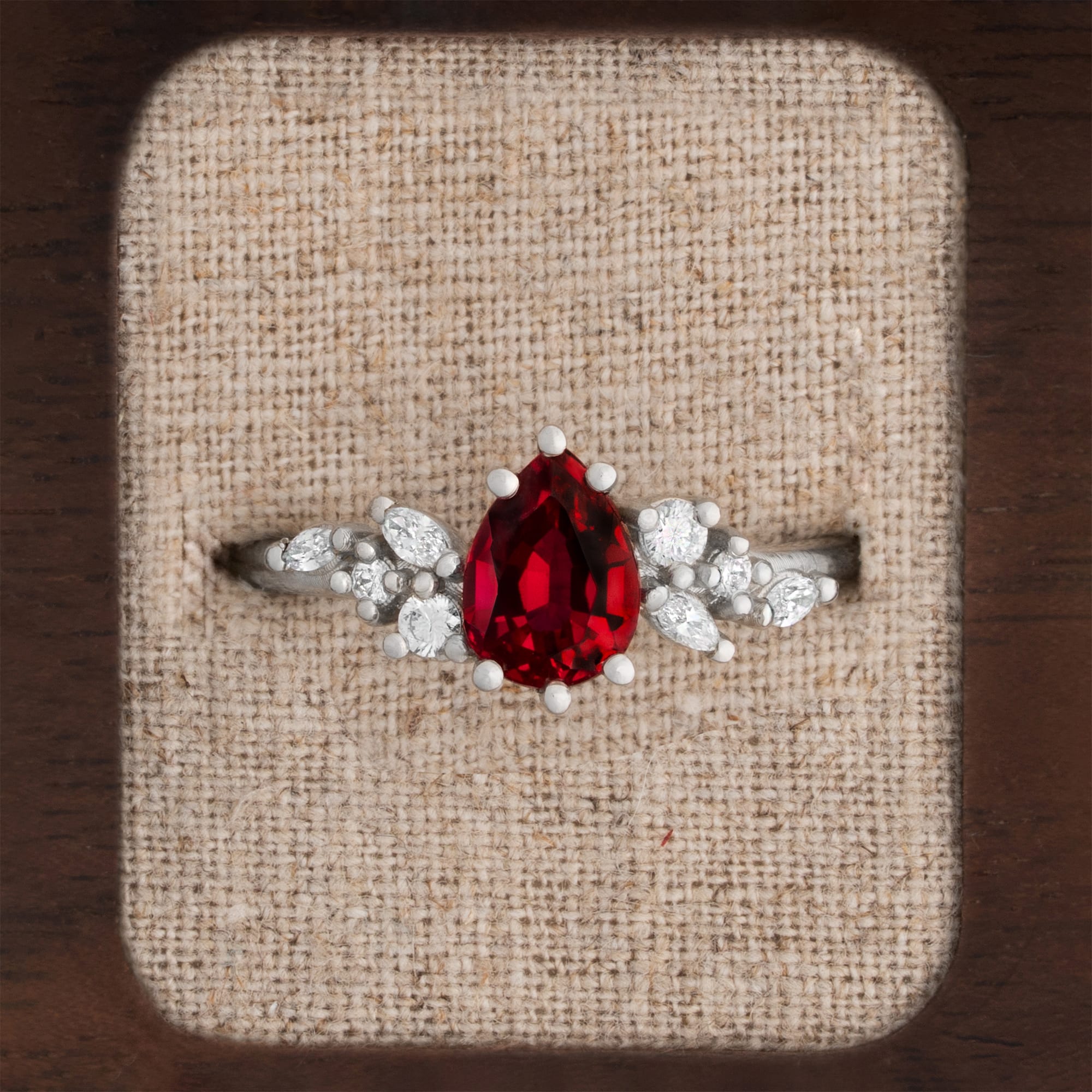 Pear cut lab grown ruby and diamond floral ring