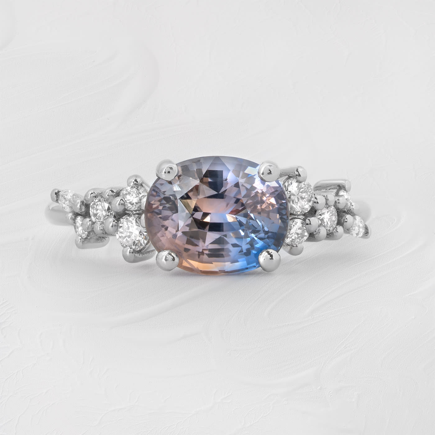 One of a kind bi colour peach and blue sapphire and diamond floral ring product image
