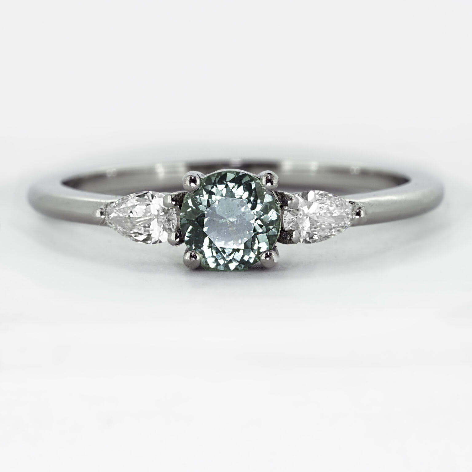  Teal sapphire and diamond trilogy engagement ring product image