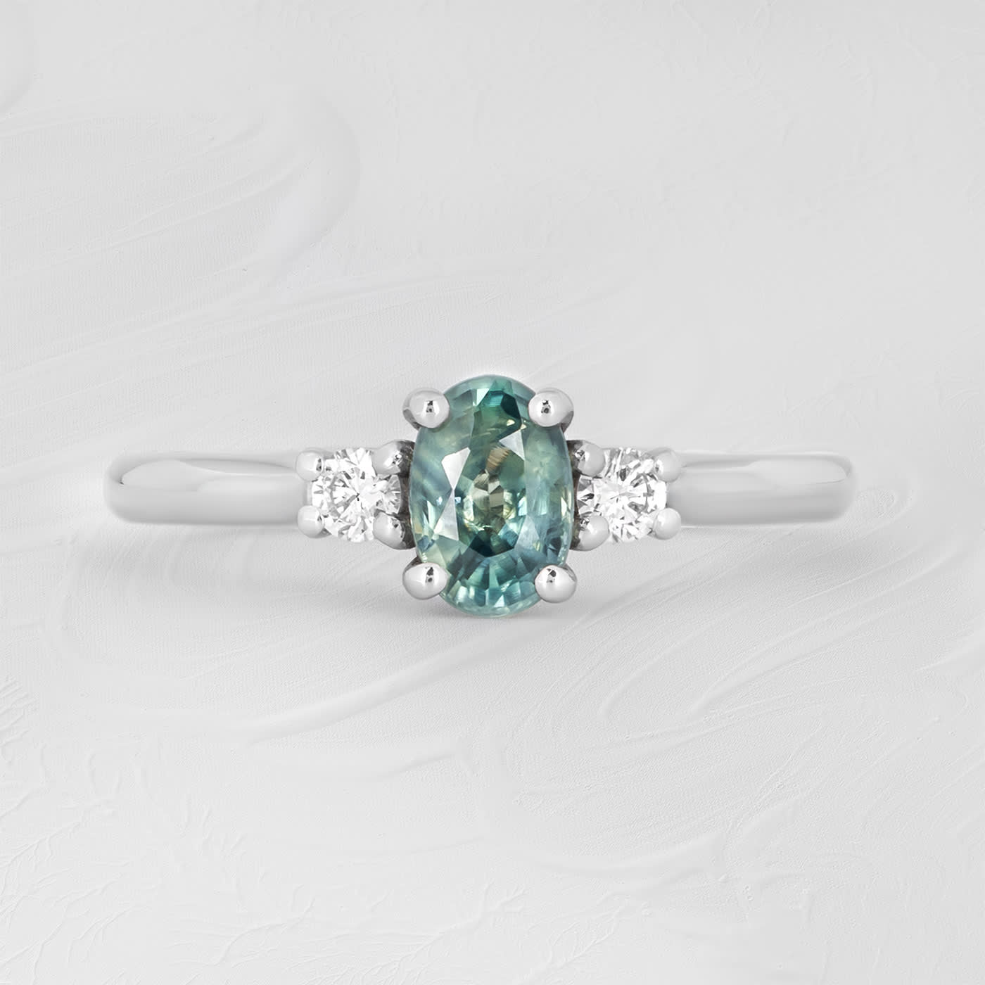 Teal sapphire and diamond ring product image