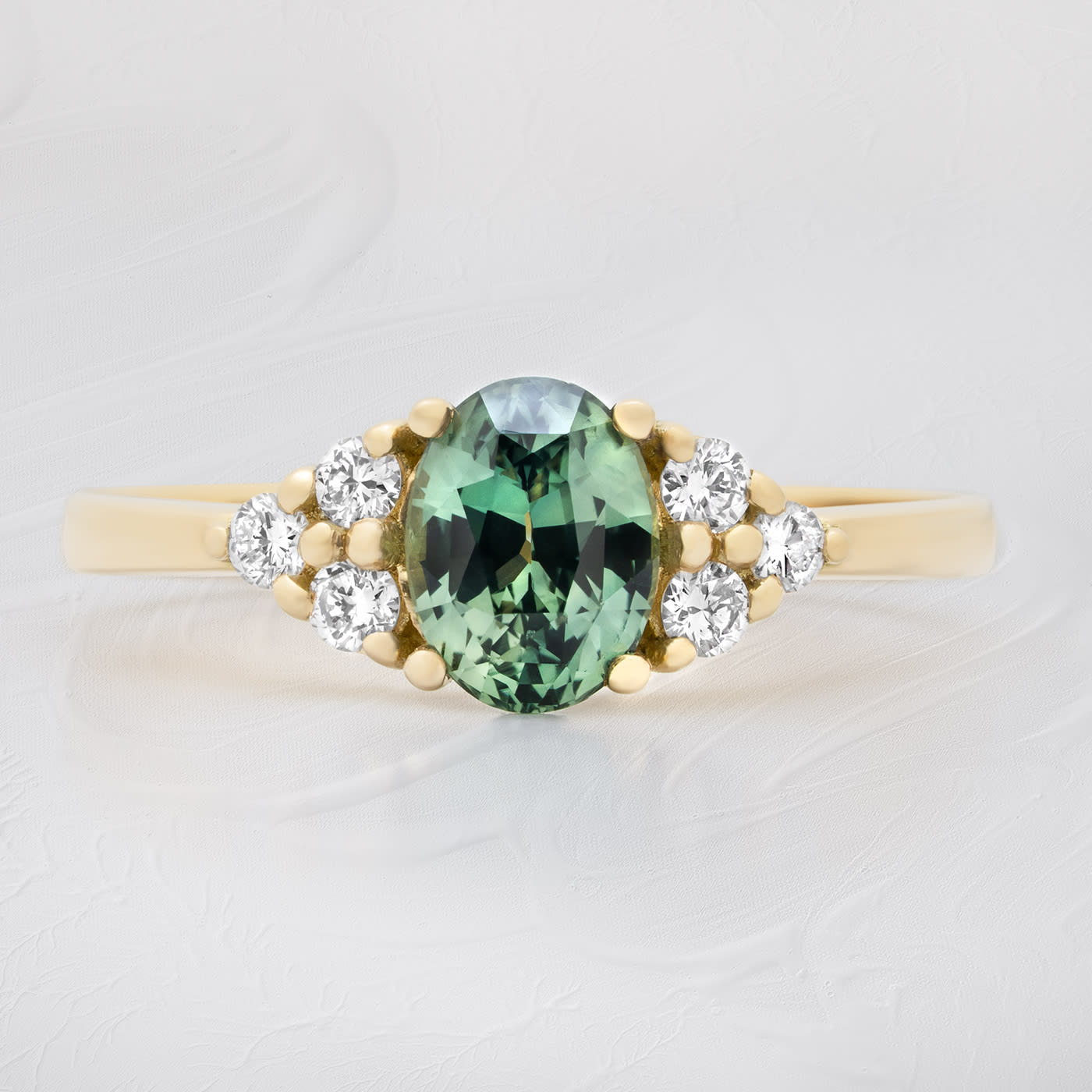 Teal sapphire and diamond ring product image