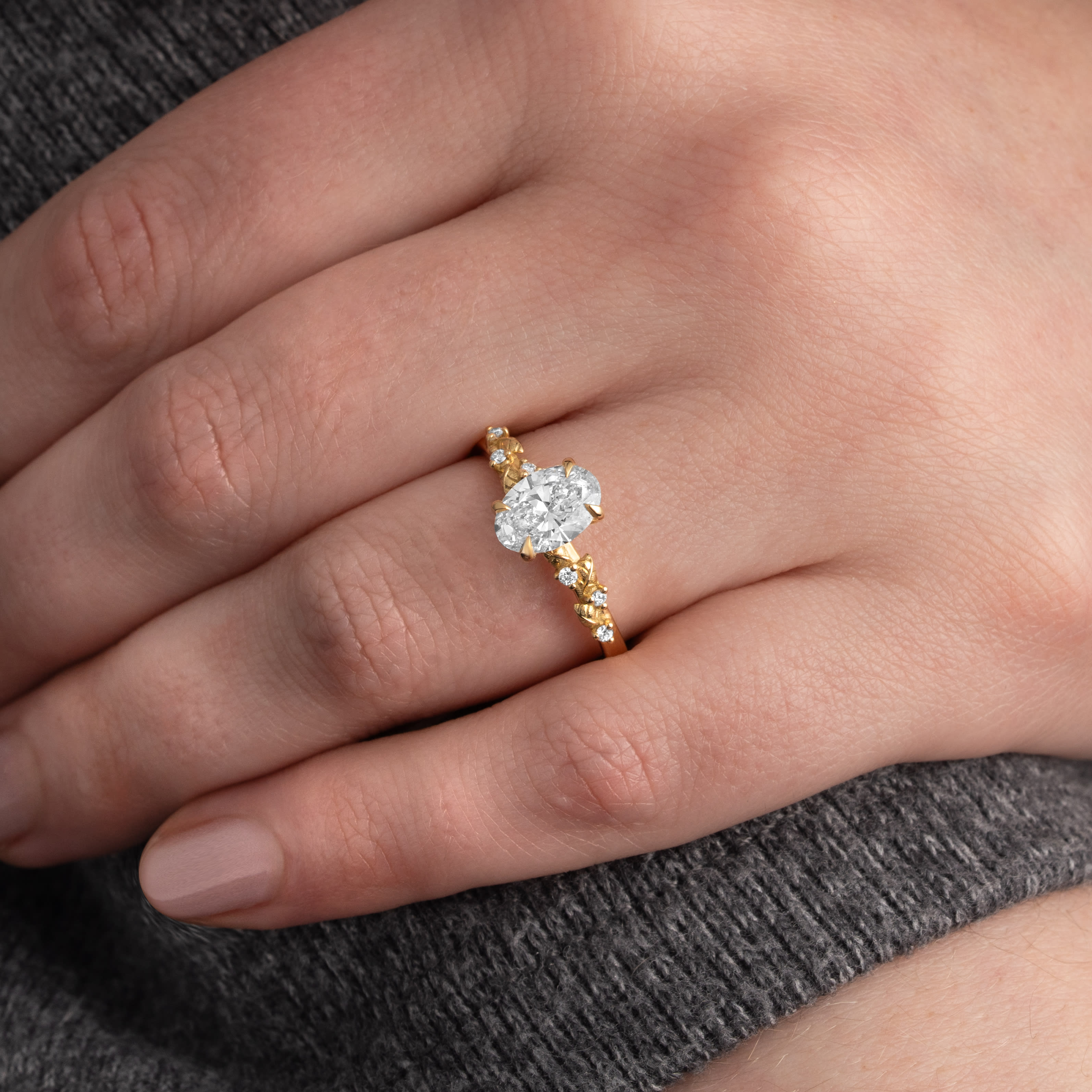 Oval lab grown diamond and floral ring 