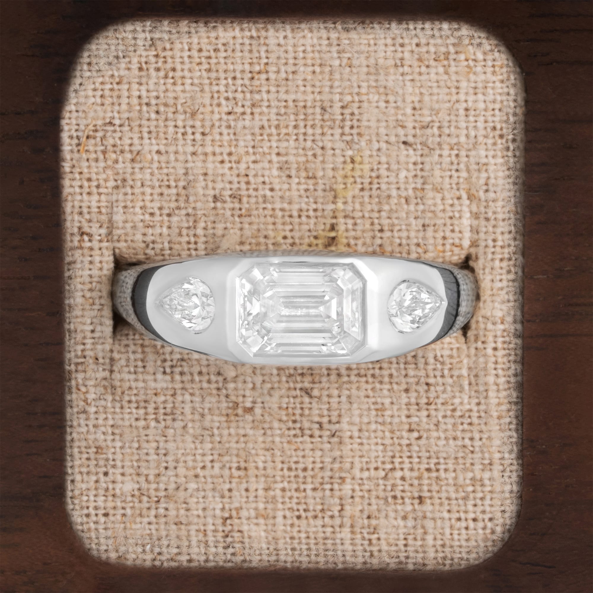 Emerald cut trilogy diamond band 