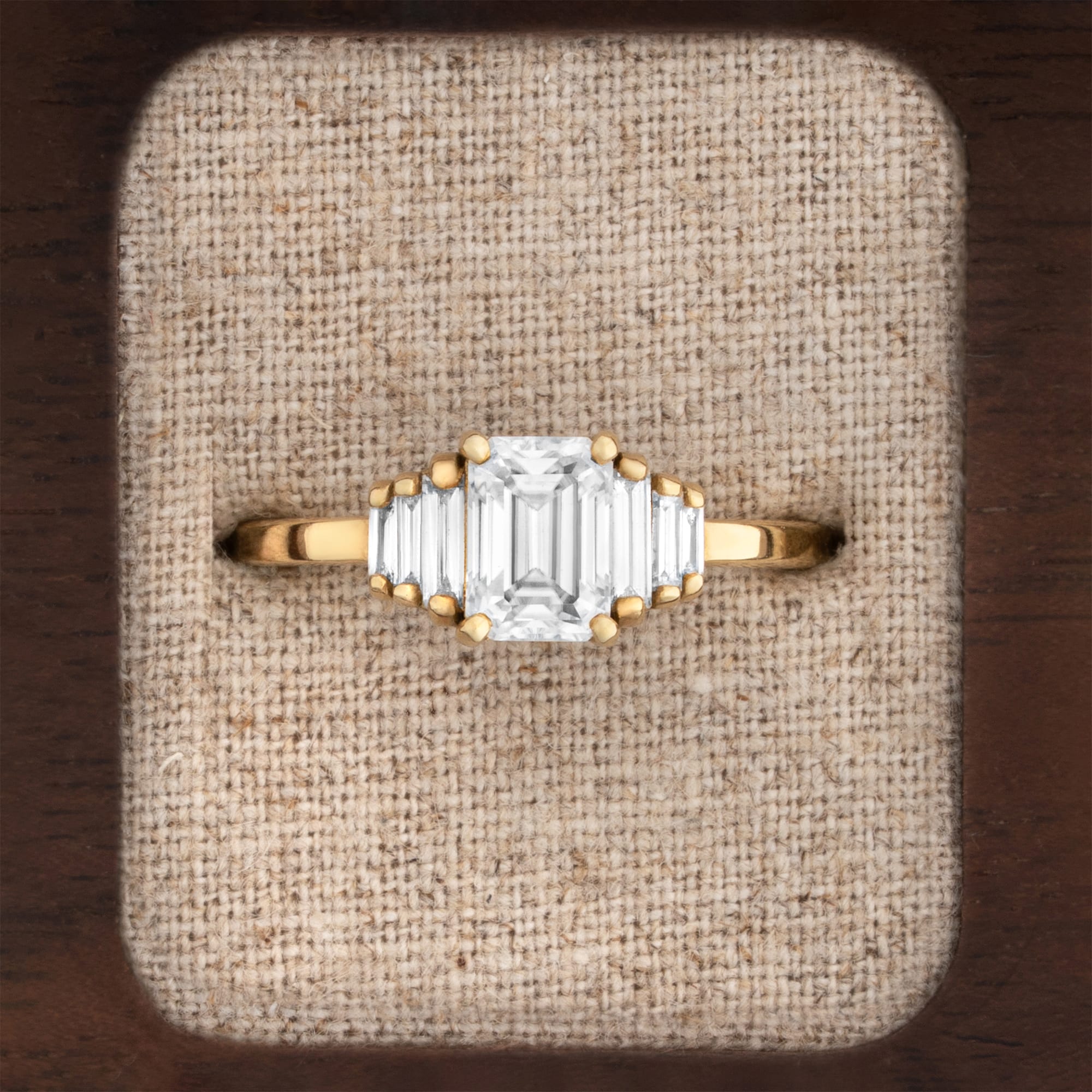 Emerald cut moissanite and baguette diamond engagement ring — 1