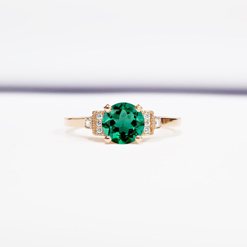 Emerald and diamond engagement ring product image