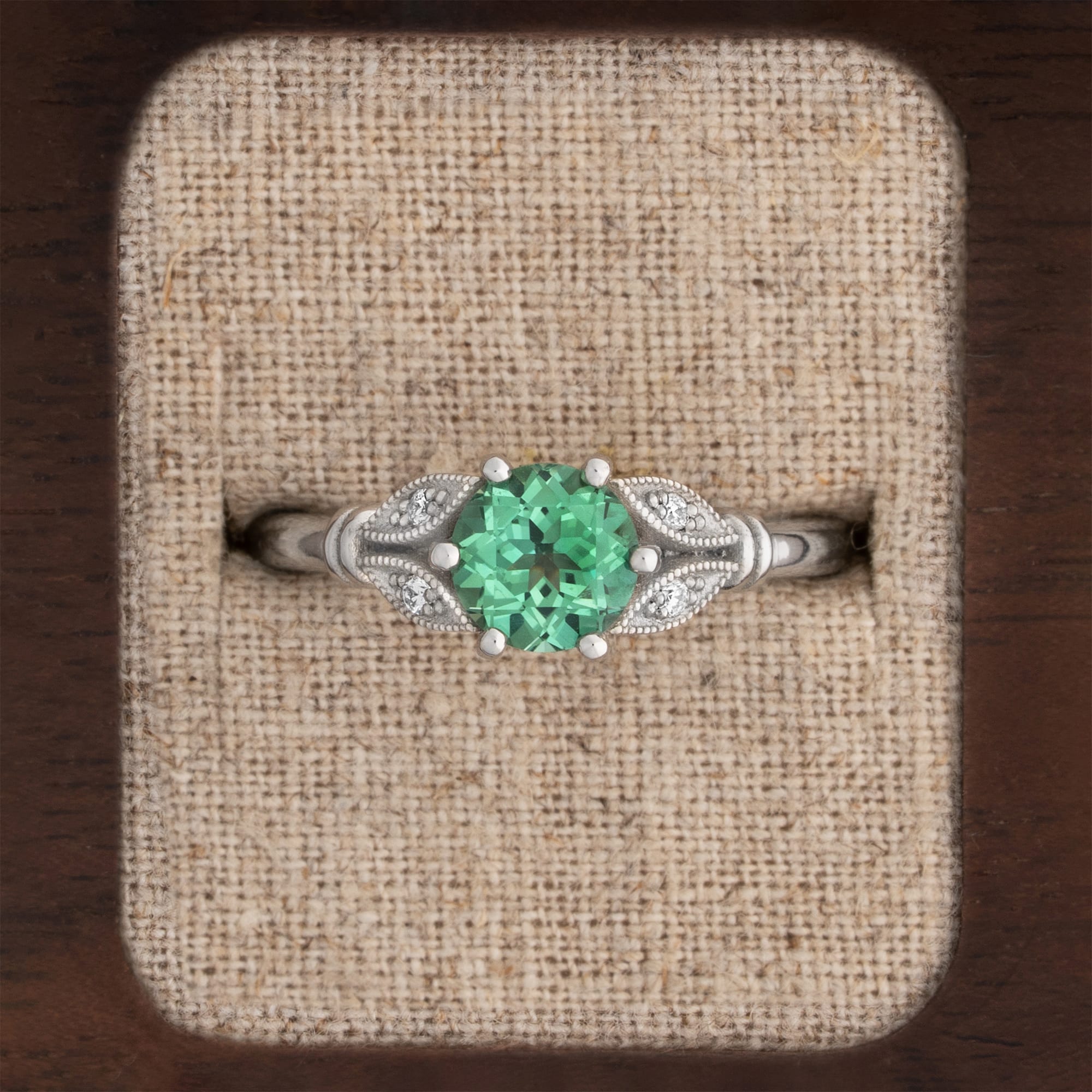 Lab grown green sapphire and diamond ring