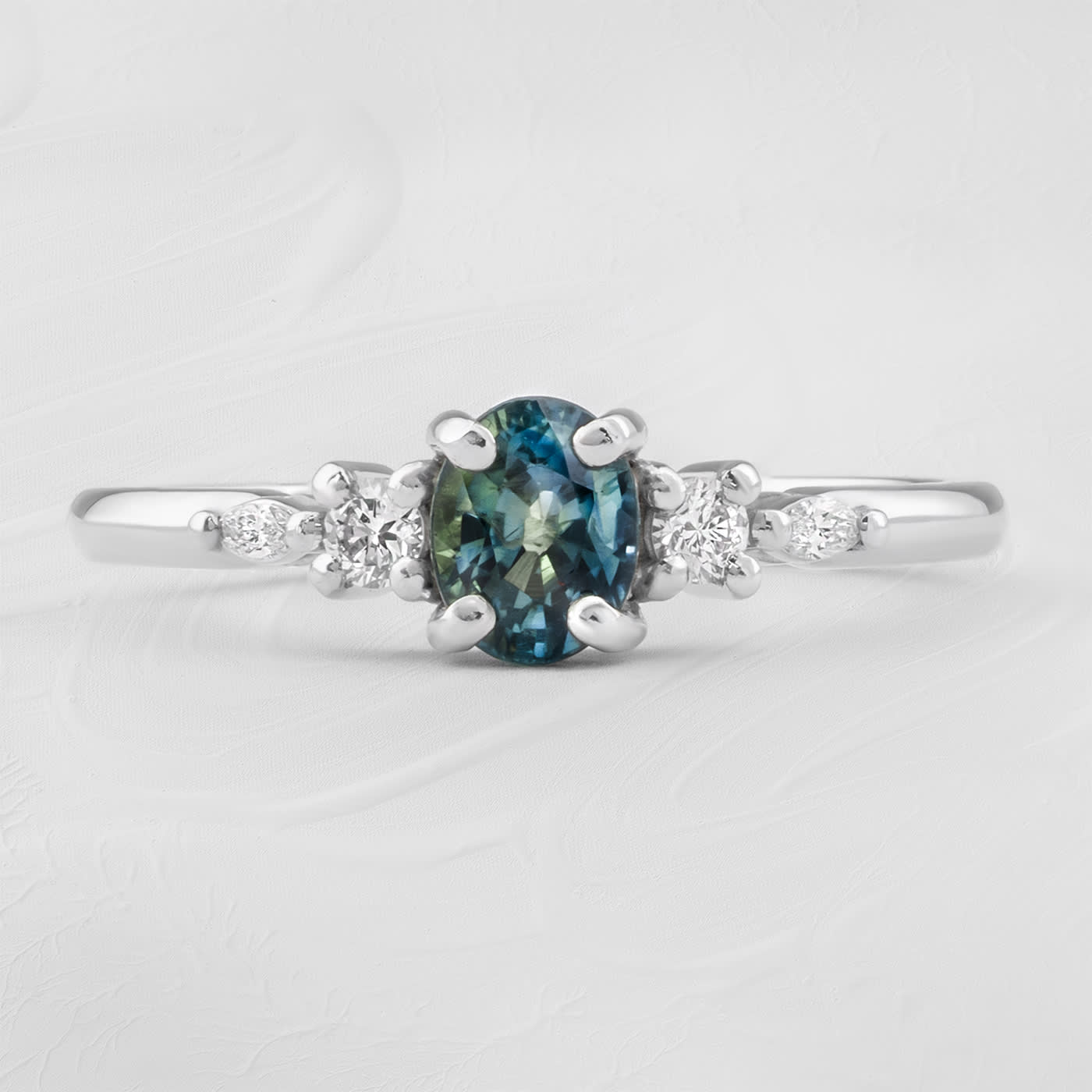 Teal sapphire and diamond ring product image
