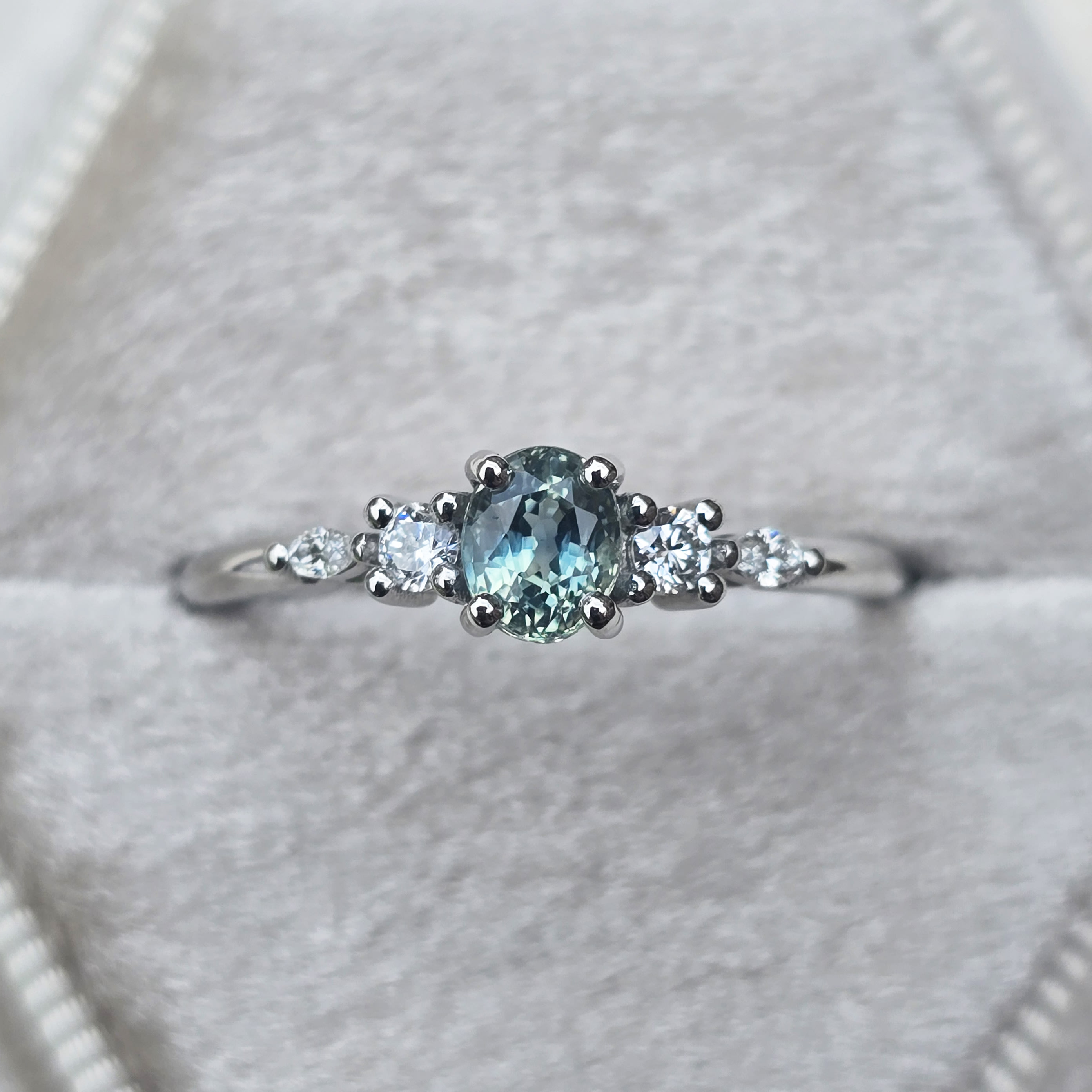 Icy teal sapphire and diamond ring product image