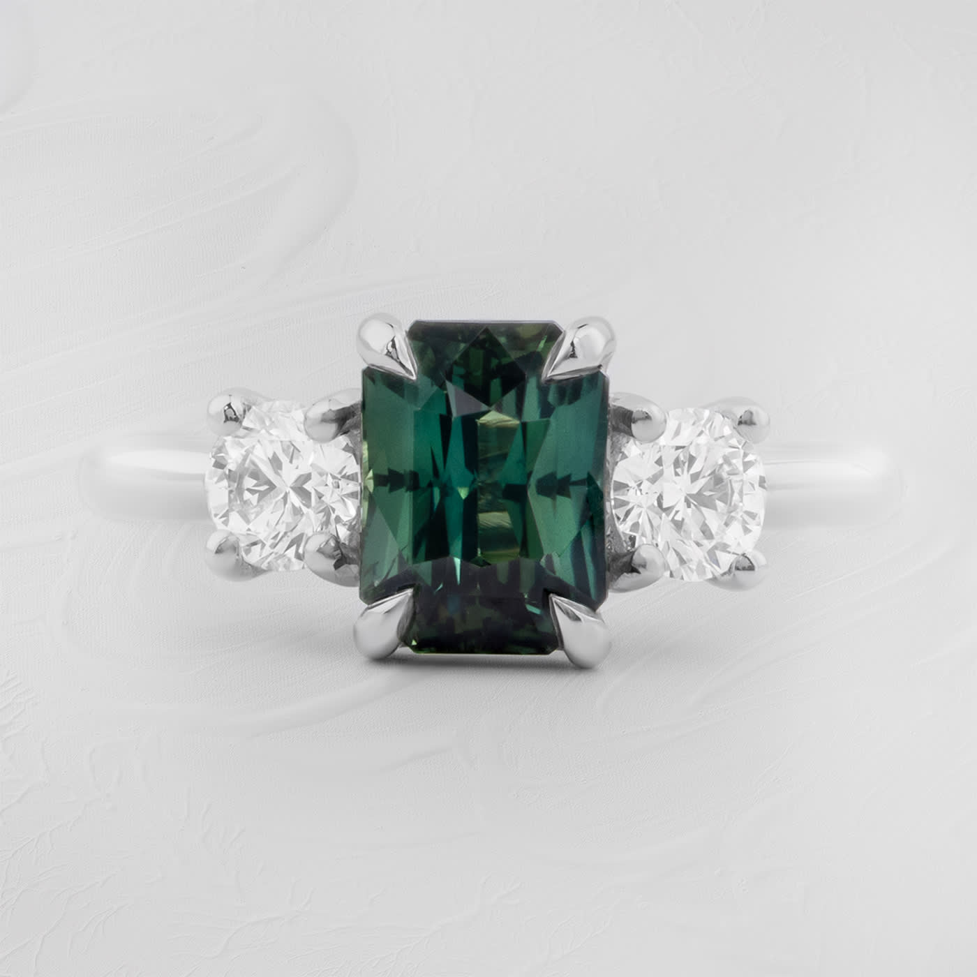 Radiant teal sapphire and diamond ring product image