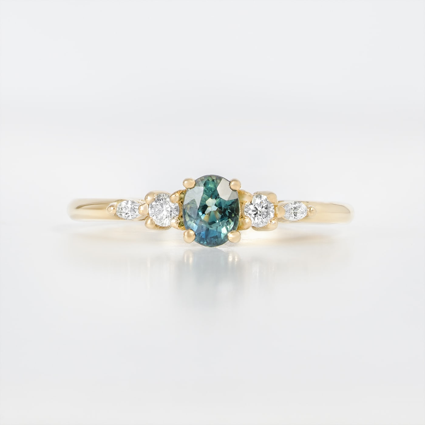 Teal sapphire and diamond ring product image