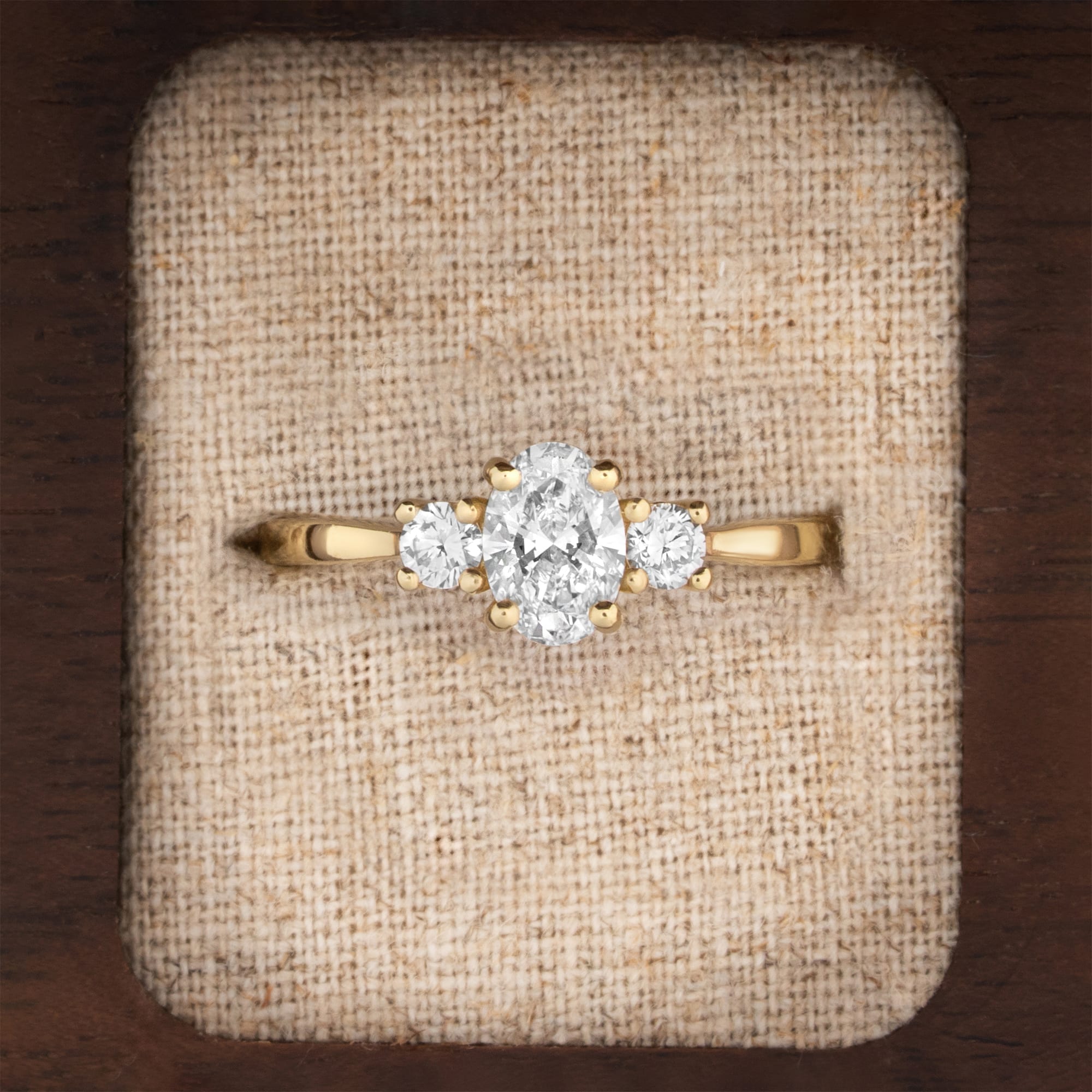 Oval and round lab grown diamond trilogy ring