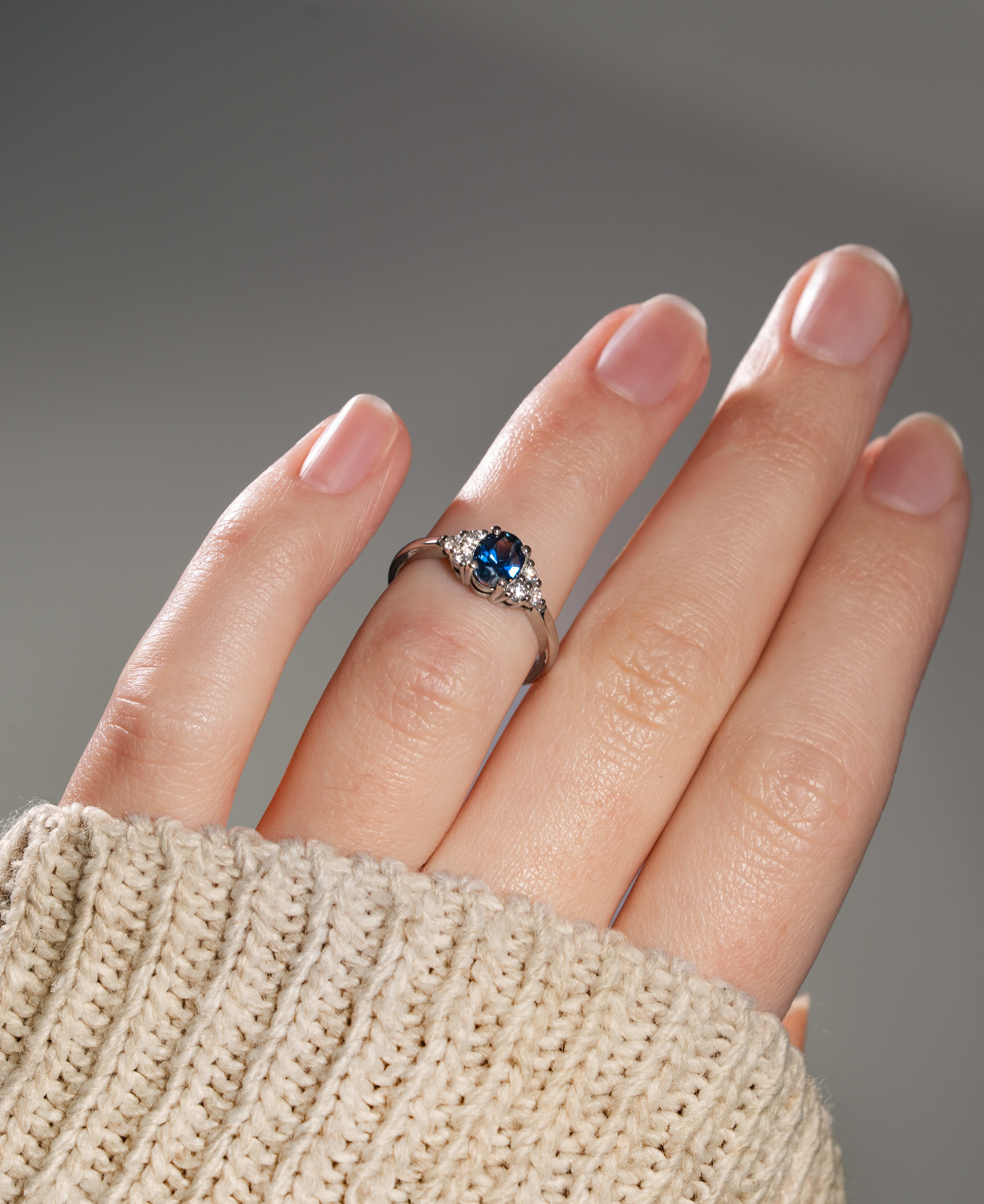 Peacock blue sapphire and diamond ring